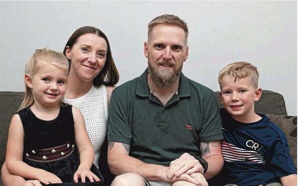 Chris and family cropped